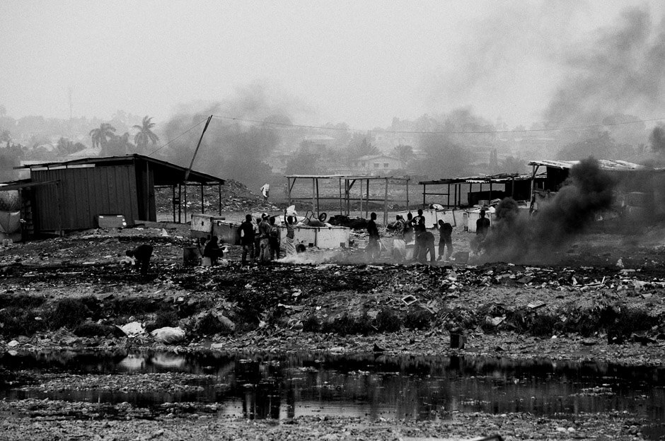 Burning electronic trash in the neighbourhood of Agbogbloshie in Ghanas capital Accra, better known by the locals as Sodom & Gomorrah.