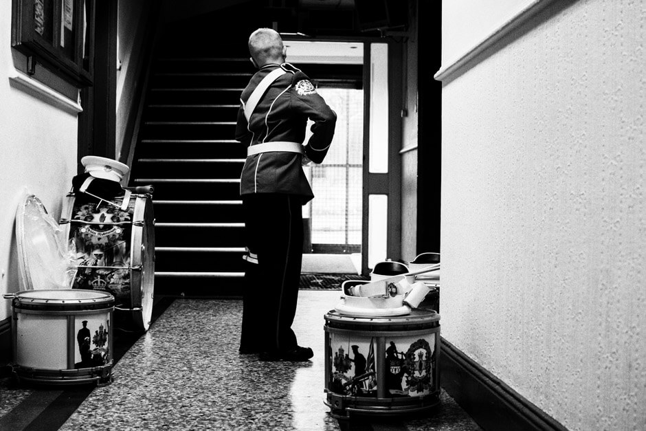 Young Loyalist bandsman preparing to march at Clifton Street Orange Hall in North Belfast.